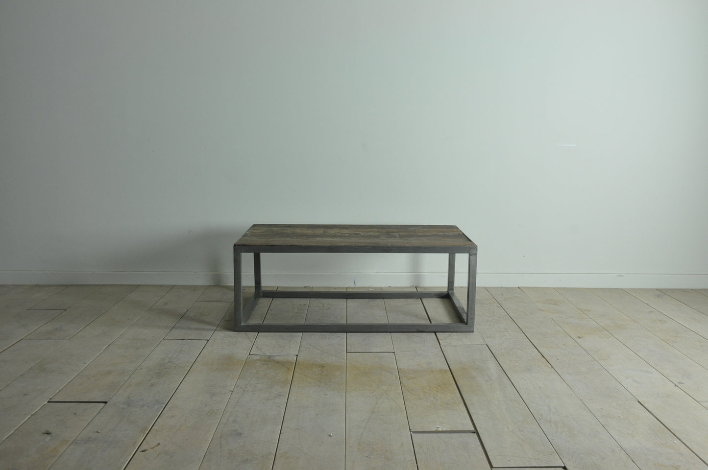 Rustic coffee table with metal base