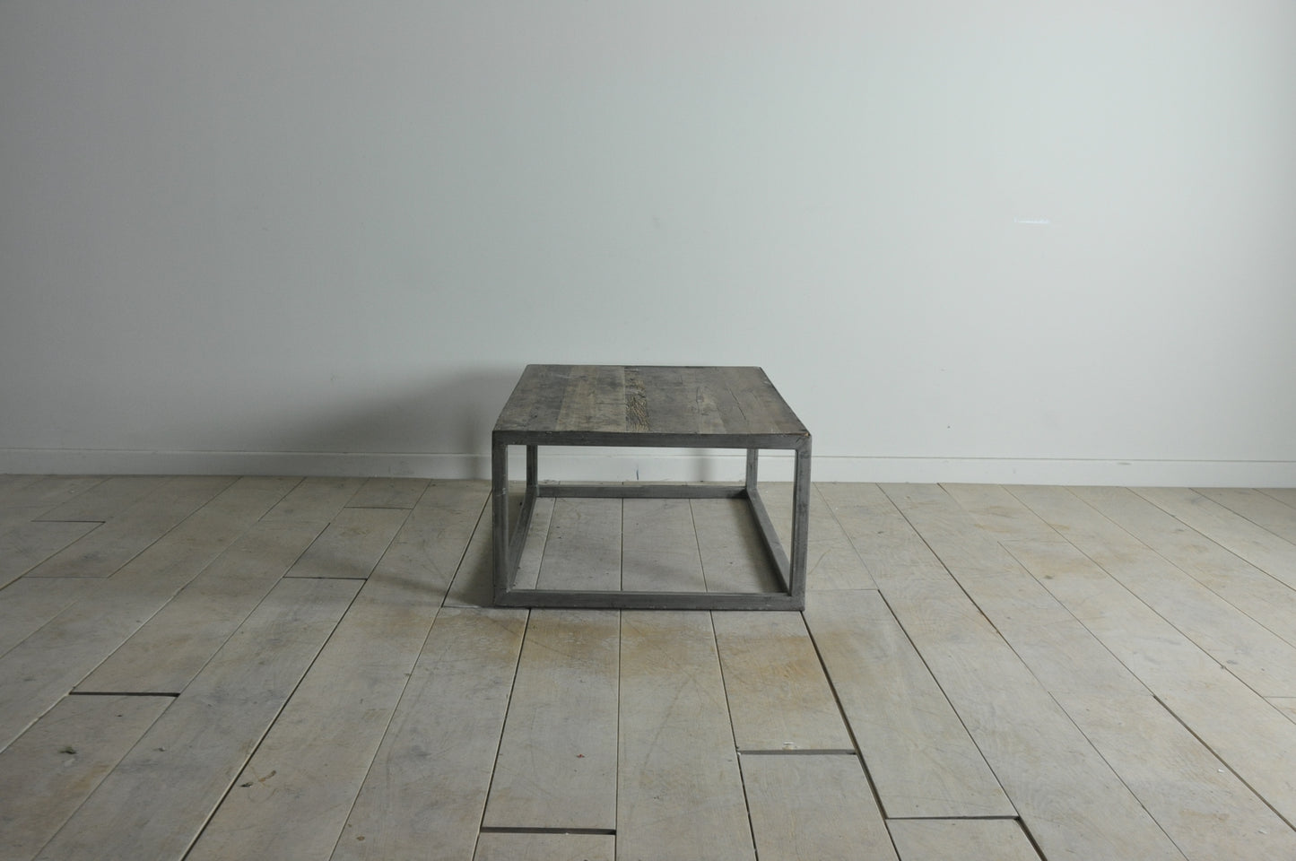 Rustic coffee table with metal base
